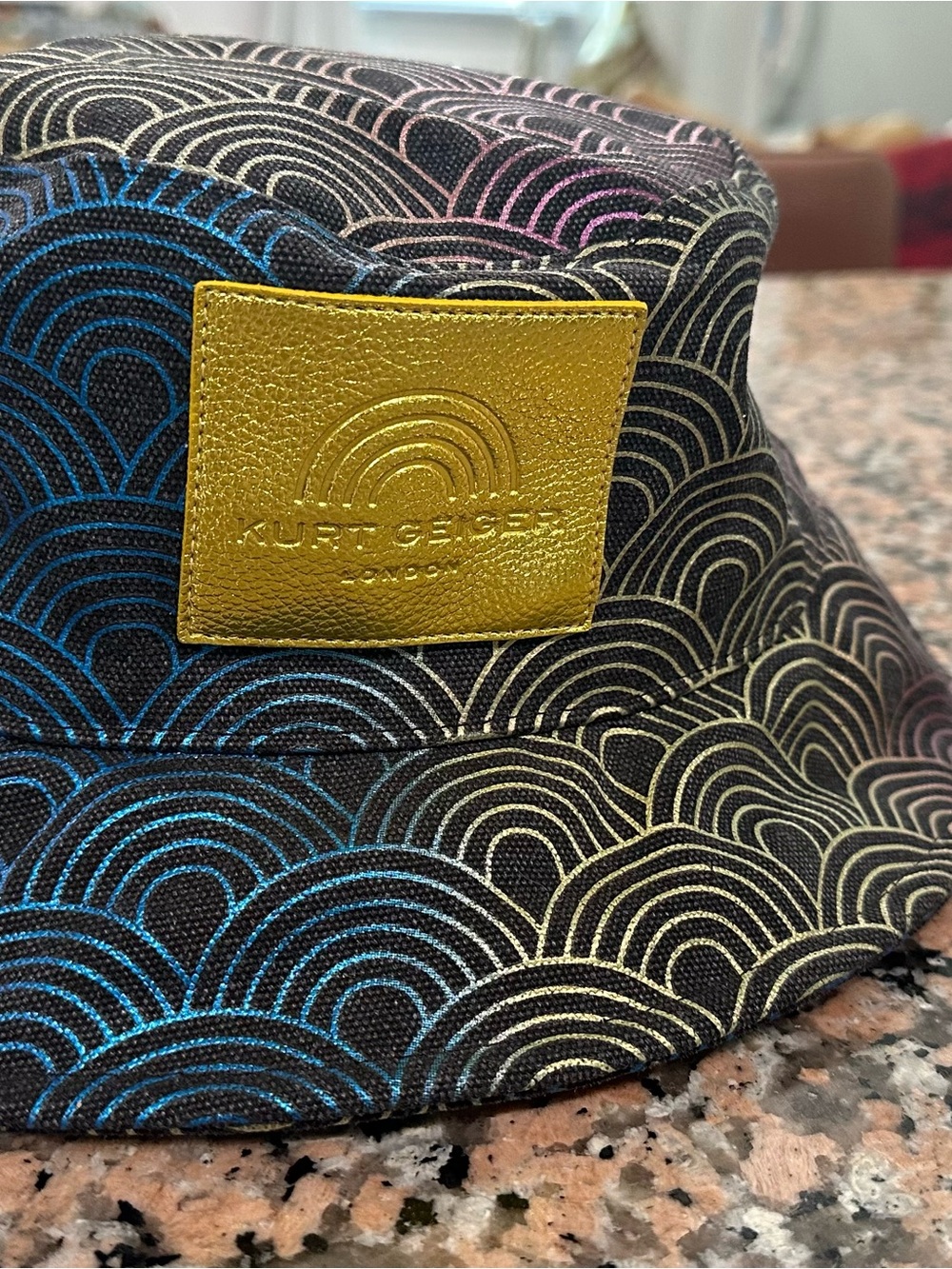 Kurt Geiger Black Bucket Hat with Multicolor Wave Print and Gold Logo Patch
